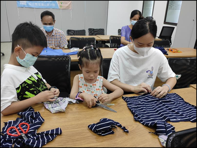 桂园街道鹿丹村社区开展“指尖上的环保--旧衣服改造”亲子工作坊活动
